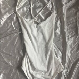 Stylish White Cross-Back Bodysuit